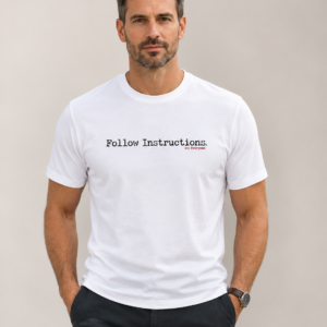 Man wearing white Follow Instructions minimal typewriter tee
