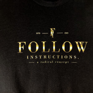 Gold-toned Follow Instructions Gilded chest print detail