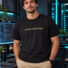 Man wearing Follow Instructions Glitched Literal Goods black tee in a tech workspace