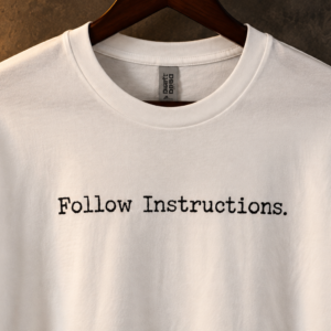 Close-up of Follow Instructions Typewriter black typewriter print