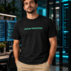 Man wearing Follow Instructions Glitched black men's graphic tee in a modern tech workspace